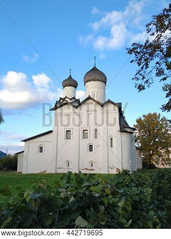 View Of The Ancient Spaso-preobrazhensky Monastery With Wooden Domes, White Facade, Windows With Pla