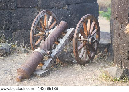 Old Rusted Cannon Body Propped Up On Wooden Wheels At Kolaba Fort, Alibag, Maharashtra, India.