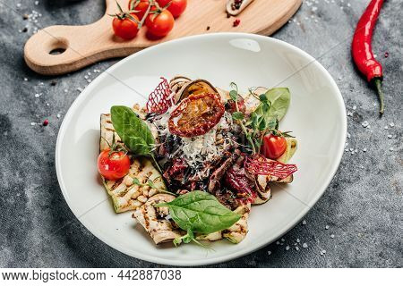 Salad With Grilled Prime Beef Or Thick Slices Of Marbling Steak With Grilled Vegetables, Nuts, Sauce