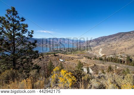 View Of The Town Of Osoyoos From Ancarchist Mountain In British Columbia