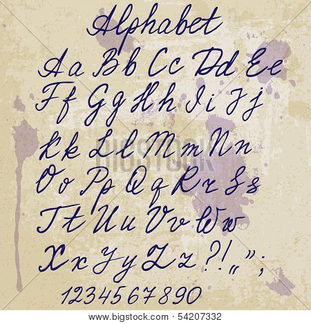 hand-written alphabet on old paper with blots