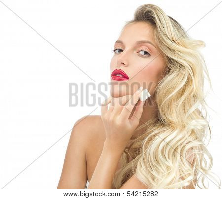 portrait of attractive caucasian woman isolated on white studio shot eating sugar