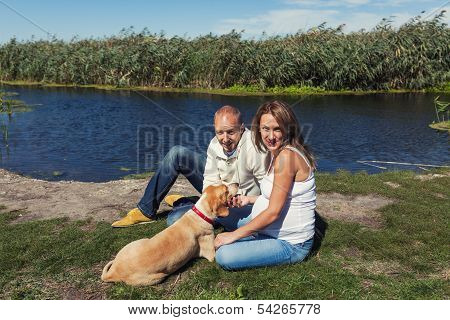 Young Couple With Dog