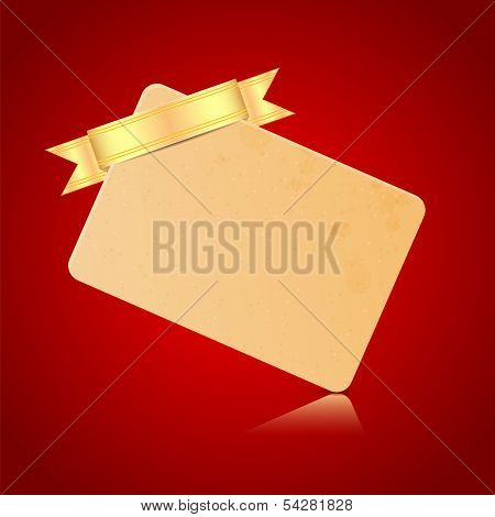 Card With A Golden Ribbon On A Red Background.blank Sheet Of Paper For The Congratulatory Message.ve