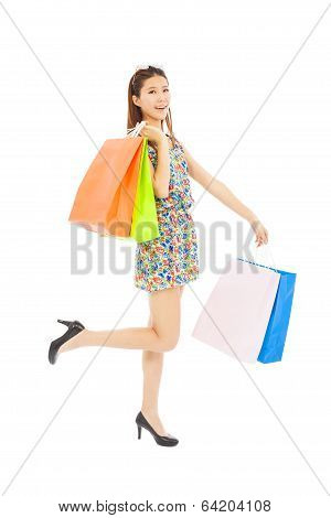 Happy Young Woman With Shopping Bags
