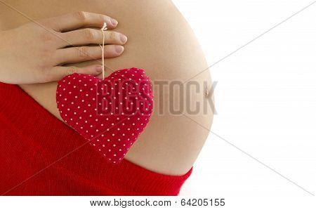 Close up on pregnant belly.