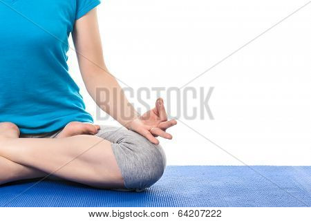 Close up of yoga Padmasana (Lotus pose) cross legged position for meditation with Chin Mudra - psychic gesture of consciousness