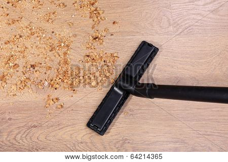 Vacuuming floor in house