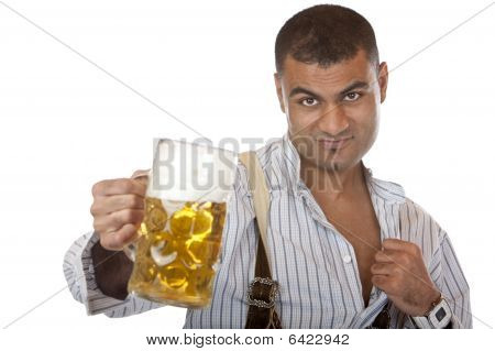 Uomo attraente sexy con Lederhose tiene l'Oktoberfest Beer Stein