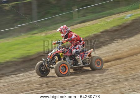 Dynamic Shot Of Quad Racer Riding