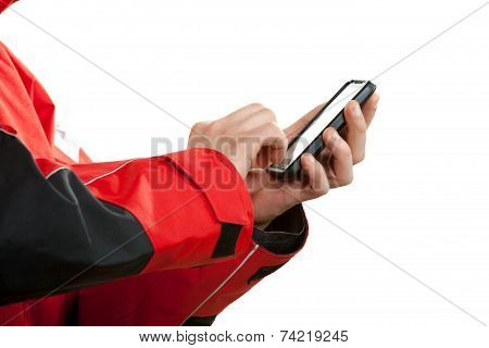 Man In Wind Jacket Using Mobile Phone Sending Sms