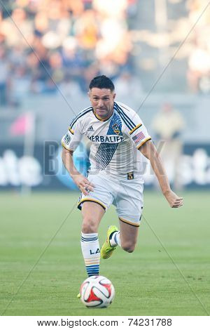 CARSON, CA - OCT 19: Robbie Keane runs the ball down during the Los Angeles Galaxy MLS game against the Seattle Sounders on October 19th 2014 at the StubHub Center.