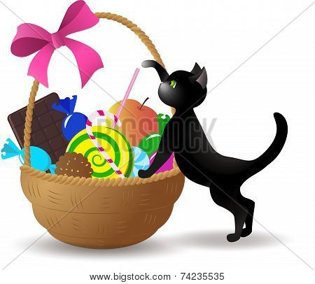 The Kitten Next To The Basket Of Sweets