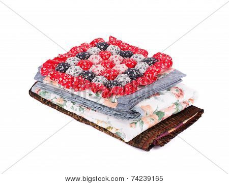 Stack of bedding set with flowers.