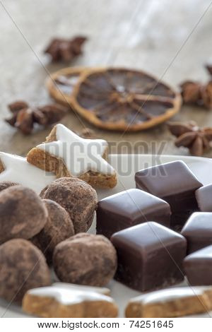 Pralines Of Chocolate And Marzipan And Cinnamon Stars