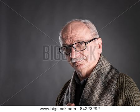 Smiling Elderly Man In Glasses