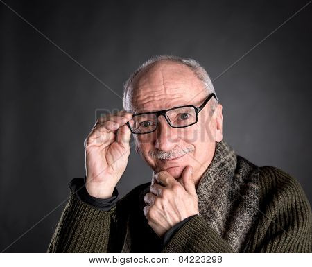 Smiling Elderly Man In Glasses