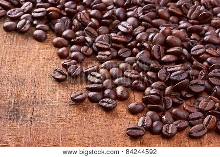 Coffee Beans On Wood Background