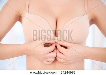 Dressing Up Her Bra.