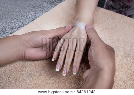 Massage after manicure.