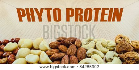 Mixed Nuts On Wood Background With Word Phyto Protein