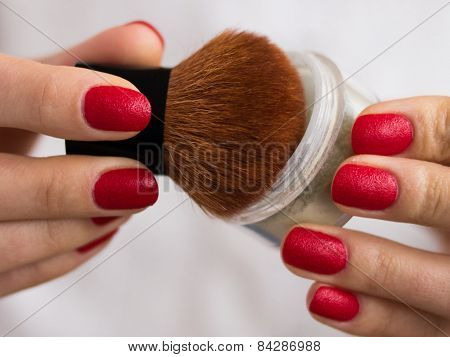 Brush And Powder In Female Hands