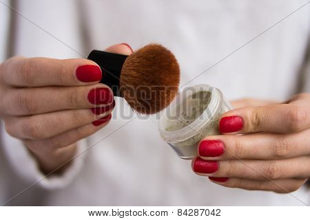 Brush And Powder In Female Hands
