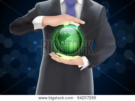Hands holding earth with green of background on blue and black