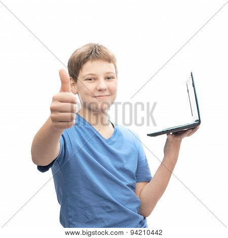 Young boy with a small notebook computer