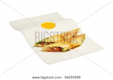 Tasty roll with meat, salad and sauce