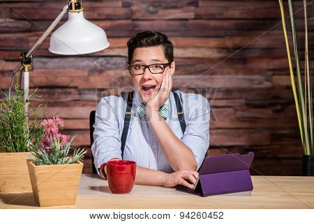 Excited Woman At Desk