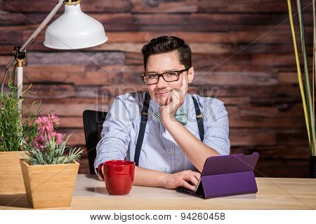 Wondering Female In Suspenders At Desk