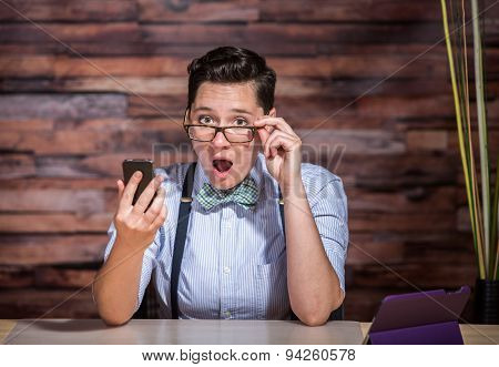 Surprised Woman Looking At Phone