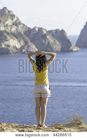 Girl Back Looking Sea And Es Vedra Ibiza, Island.