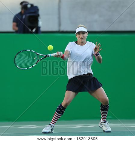 RIO DE JANEIRO, BRAZIL - AUGUST 14, 2016: Olympic champion Bethanie Mattek-Sands of United States in action during mixed doubles final of the Rio 2016 Olympics