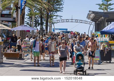 Gold Coast, Australia - September 22, 2016: View of many tourists walking along Cavill Avenue, the busiest street located in the heart of the Surfers Paradise shopping and entertainment precinct.