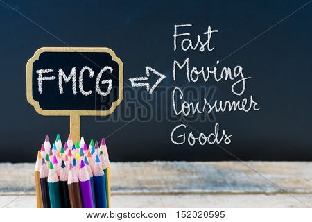 Business Acronym Fmcg Fast Moving Consumer Goods Written With Chalk On Wooden Mini Blackboard Labels