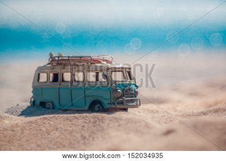 Vintage miniature van in vintage color tone travel concept