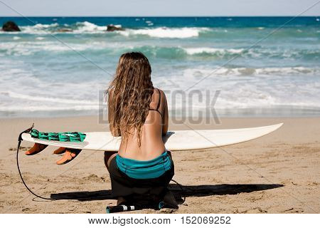 surfergirl is wating for the perfect wave