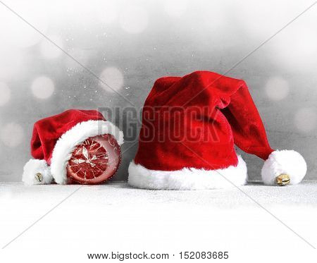 Christmas grey background with Santa hat.Happy new year. santa hat .