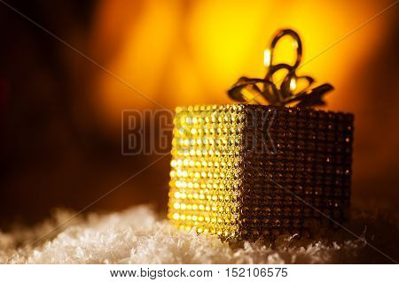 gold box gifts for Christmas multicolor background.