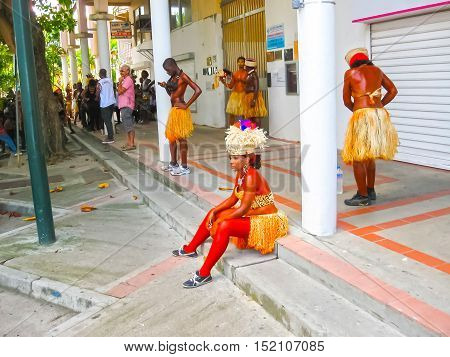 Point-a-Pitre, Guadeloupe - February 09, 2013: Beautiful black girl preparing at the Caribbean Carnival at Point-a-Pitre, Guadeloupe