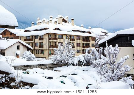 Snow covered chalets after the very hard snowfall