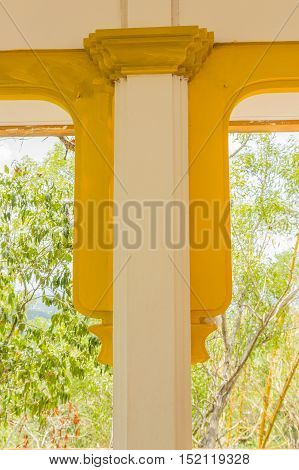 Phuket Thailand - April 25 2016 : Old Burmese or Mon style design decoration at column head at Sirey temple Phuket Thailand.