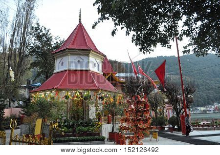 November 11, 2015: Naina Devi Temple early in the morning devoted to Naina Devi situated right on Naini Lake at Nainital, Uttarakhand, India.
Nainital is a popular hill station in Uttarakhand, named after the Goddess Naina Devi. It also known as the 'Gate