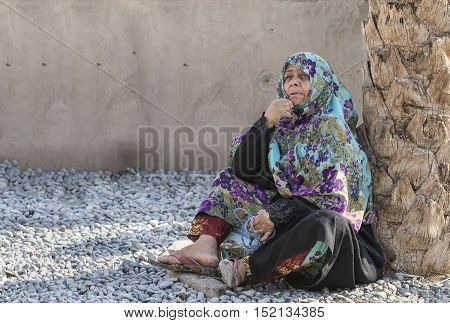 Nizwa Oman October 13th 2016: old omani woman resting