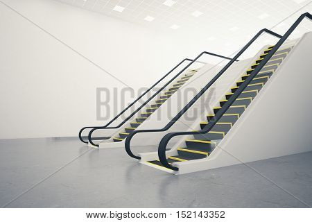 Side view of two escalators in concrete room with blank wall. Mock up 3D Rendering
