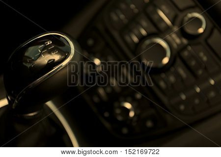 Details closeup of cockpit and dash gearstick in modern car