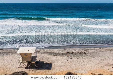 View from above of lifeguard tower facing ocean in Encinitas, California.