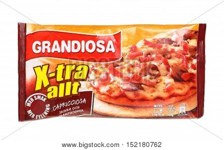Stockholm, Sweden - January 9, 2014: A portion pack pizza Capricciosa sold with the brand Grandiosa in the Swedish market. Grandiosa is a brand of frozen pizza manufactured by the company Procordia Food
